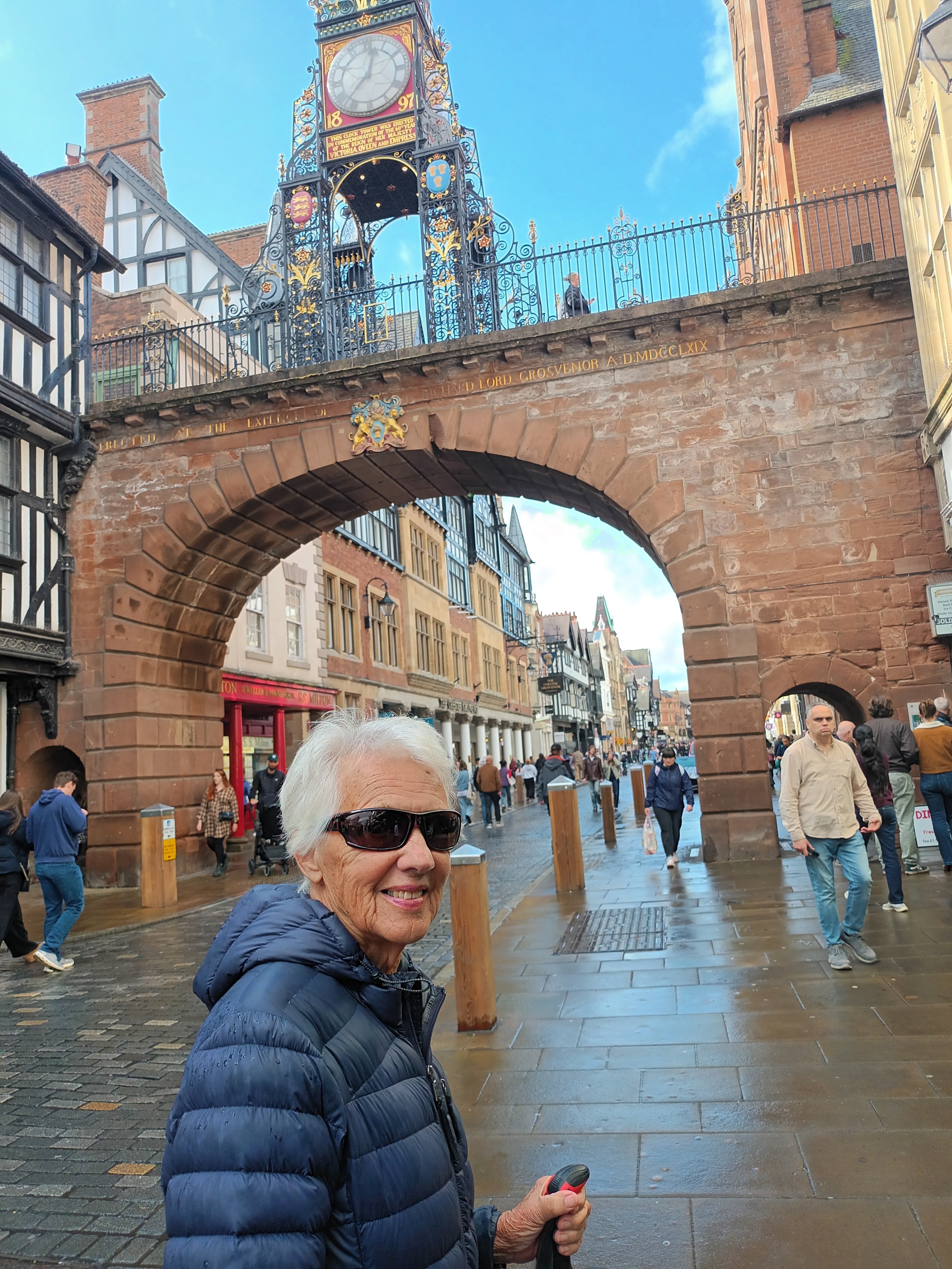 The iconic Eastgate Clock — one of Chester's most photographed landmarks. Maureen Beckett under the famous Clock Tower, part of the City Walls.